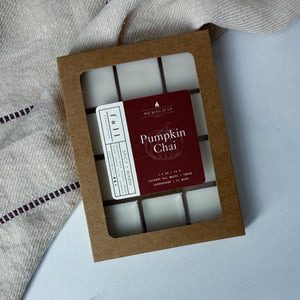 Box of pumpkin chai wax melts with a visible brand label on a light background